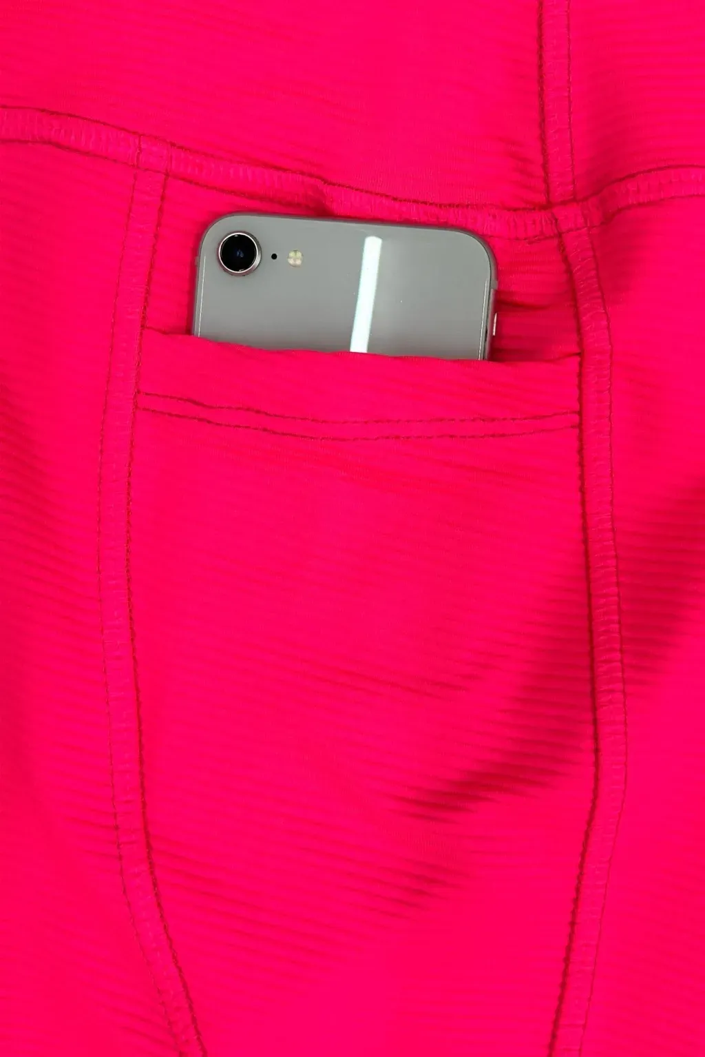 Mallas deportivas de color rosa brillante.