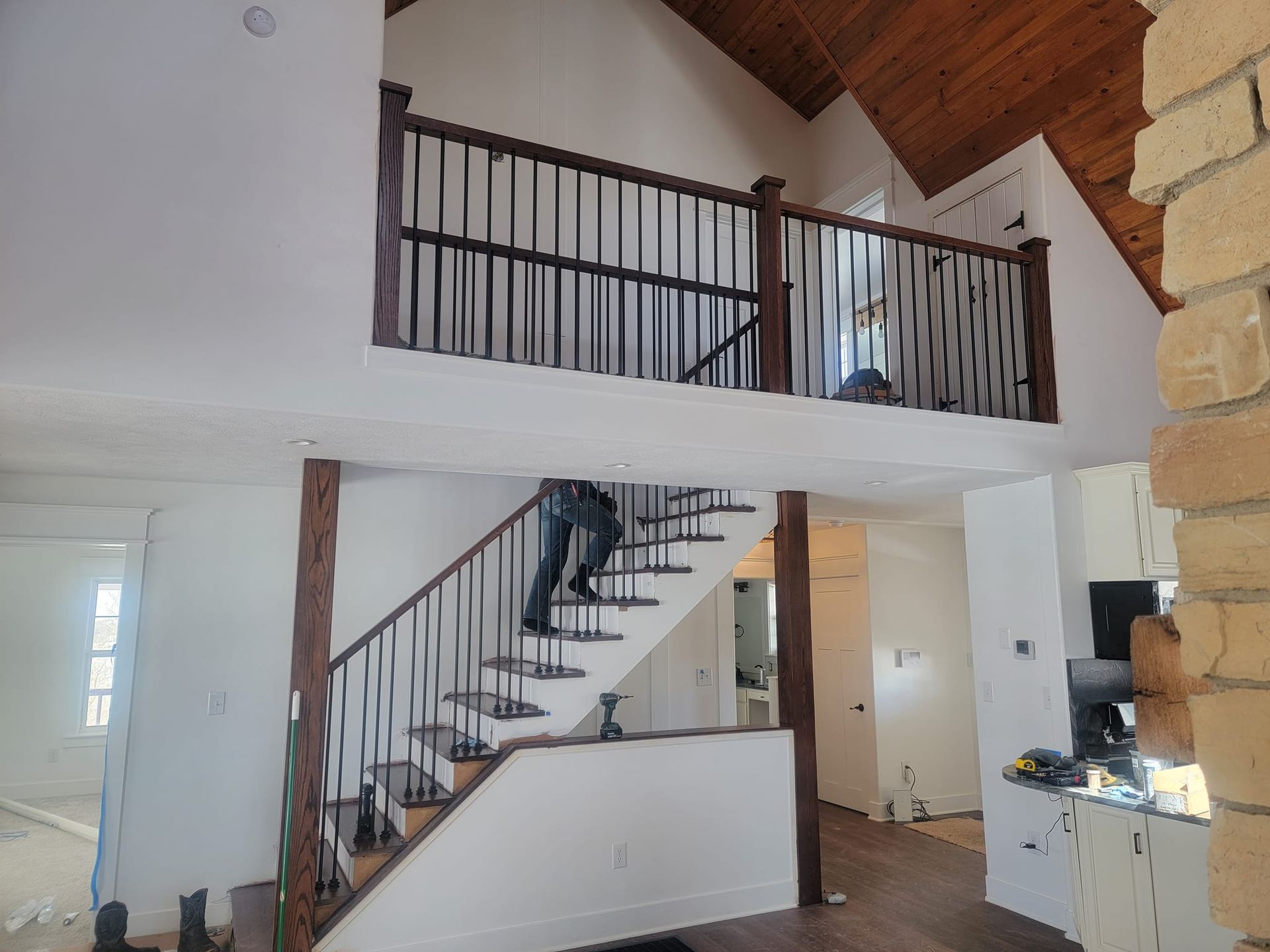 A staircase leading to a loft in a house.