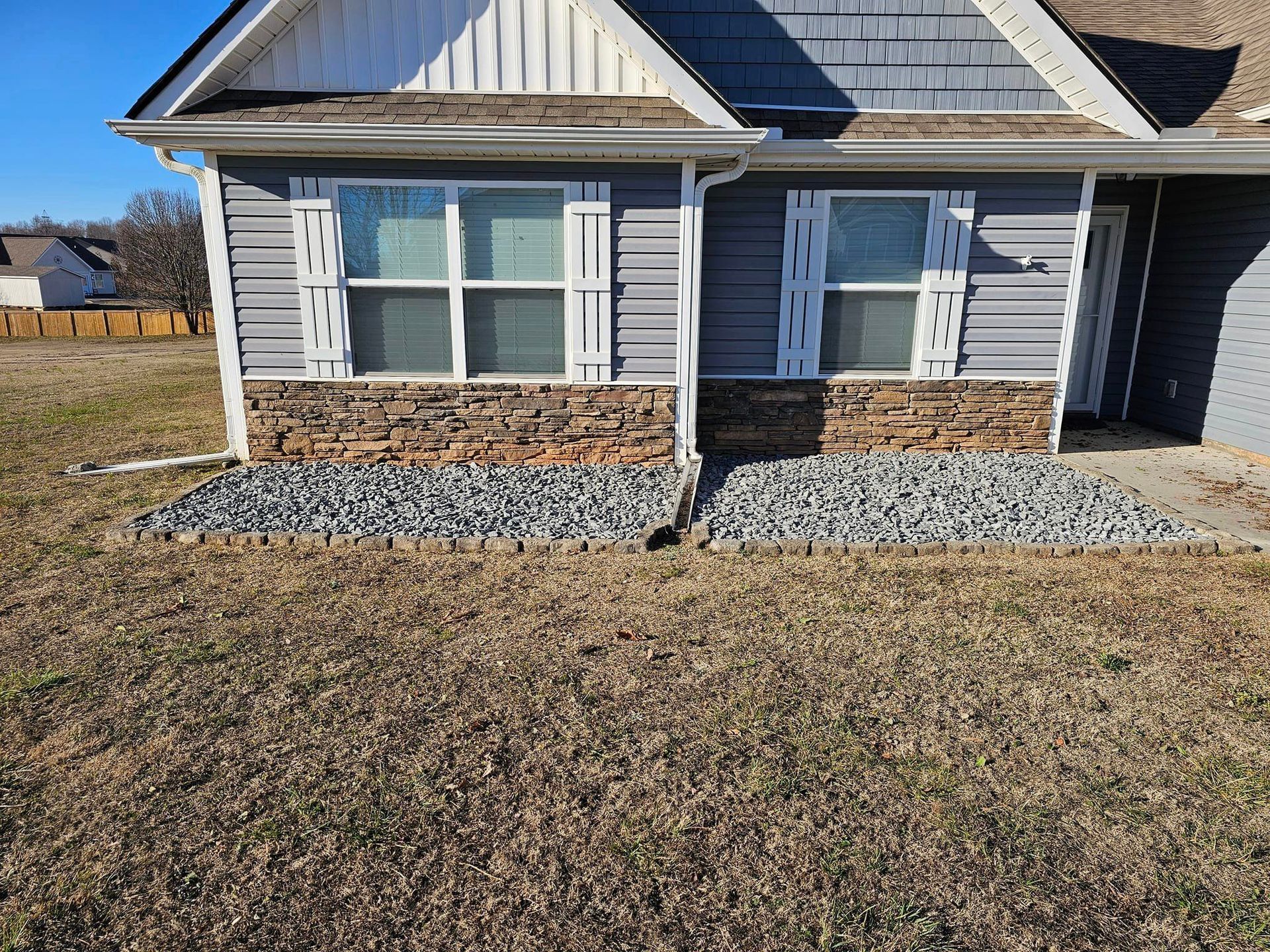 A house with a gravel walkway in front of it duncan 