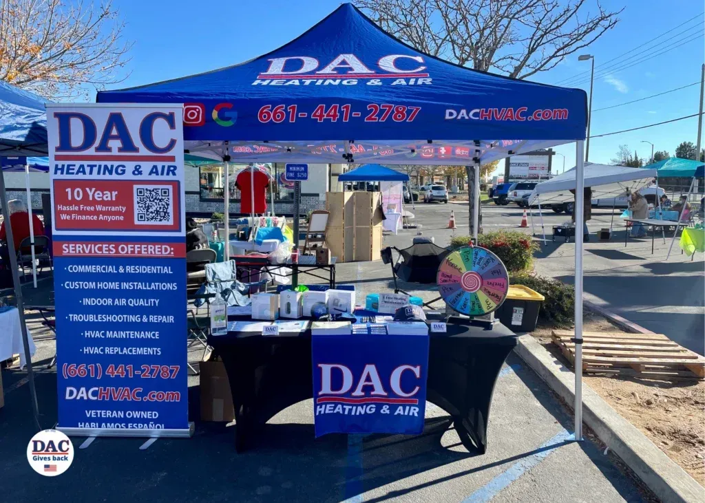 A blue tent with the word dac on it