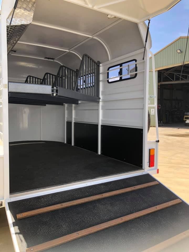 The Inside of a Horse Trailer With the Door Open and Stairs — SNS Custom Fabrication in Bundaberg East, QLD