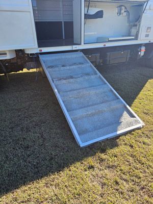 A Ramp is Being Installed on the Side of a Truck — SNS Custom Fabrication in Bundaberg East, QLD