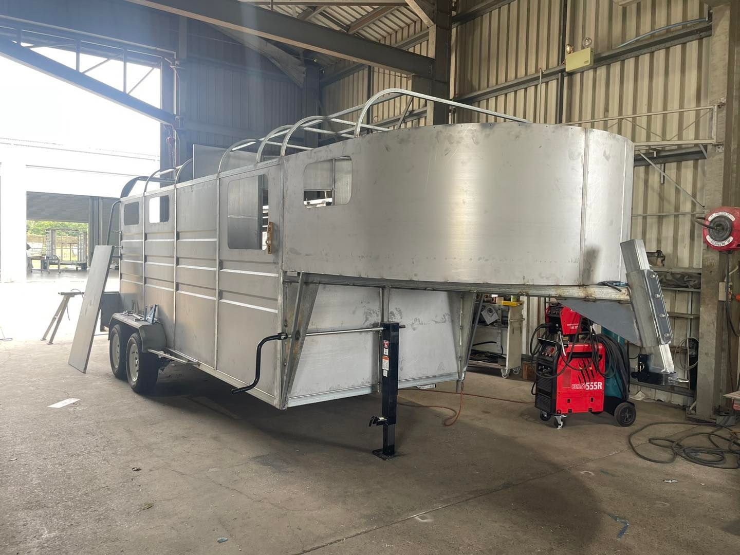 A Stainless Steel Trailer is Being Built in a Garage — SNS Custom Fabrication in Bundaberg East, QLD