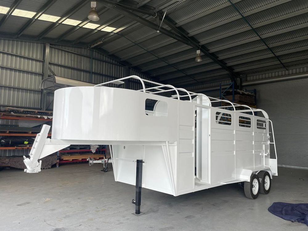 A White Horse Trailer is Parked in a Warehouse — SNS Custom Fabrication in Gin Gin, QLD