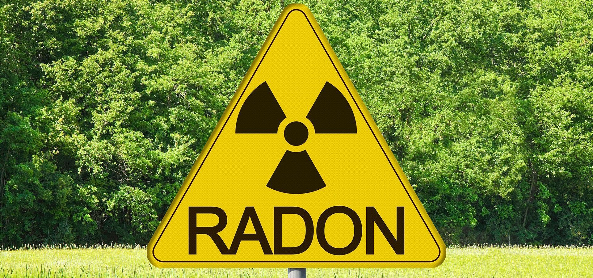 A yellow sign with a nuclear symbol and the word radon on it