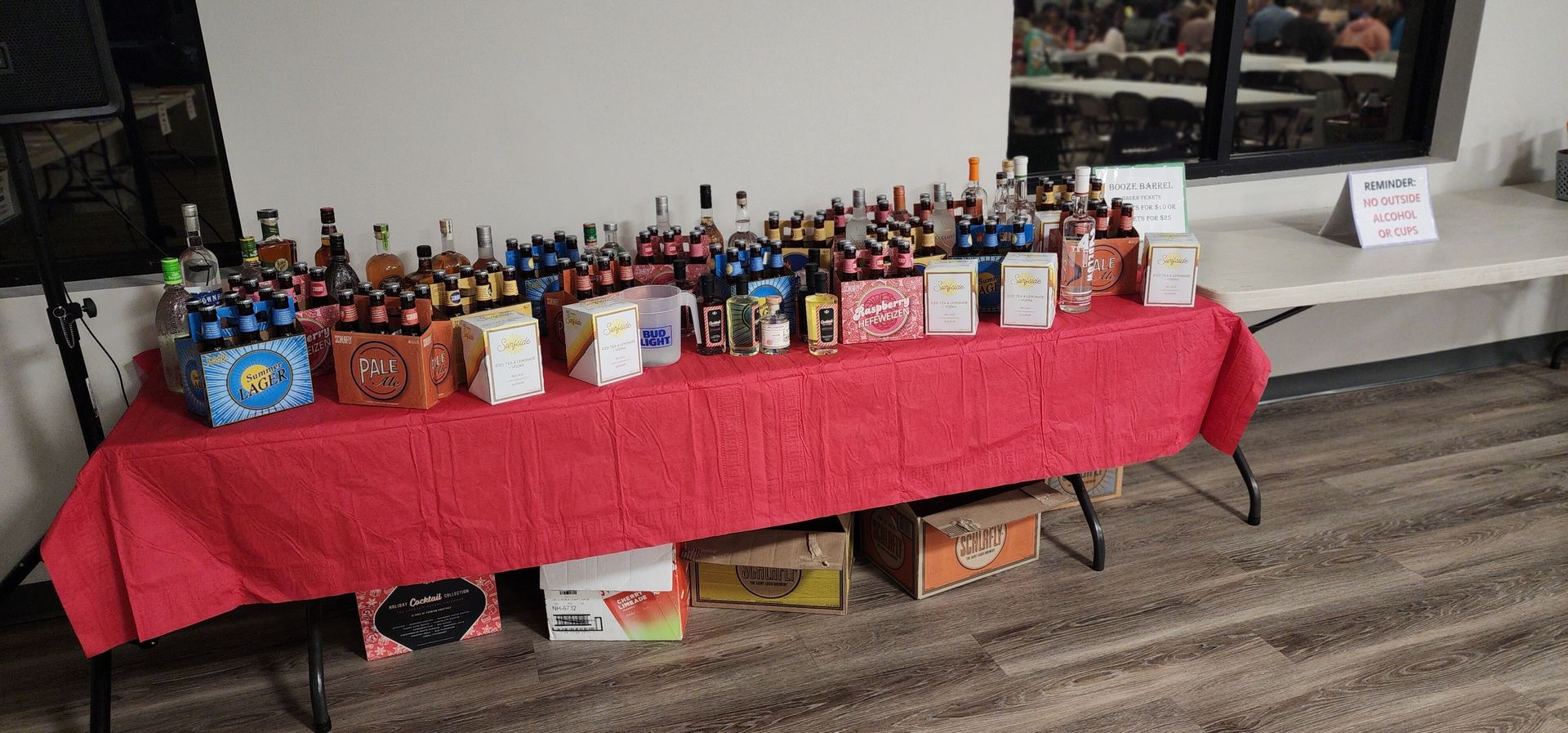 A table with lots of bottles and boxes on it.