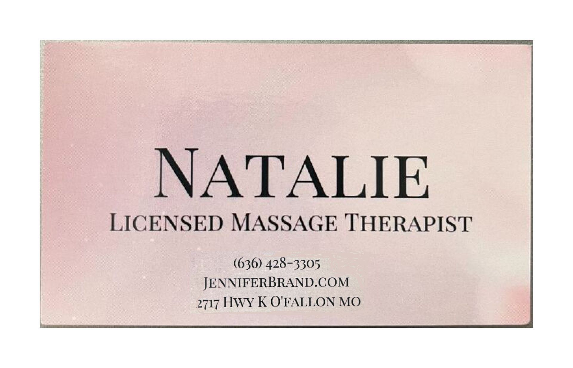 Business card for Natalie, a licensed massage therapist.  Pink background, black text, contact information.