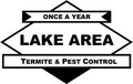 A black and white logo for lake area termite and pest control.