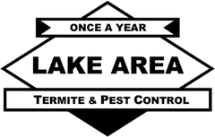 A black and white logo for lake area termite and pest control.