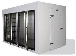 A white room with a lot of windows and doors.