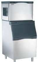 A stainless steel ice cube maker with a black lid on a white background.