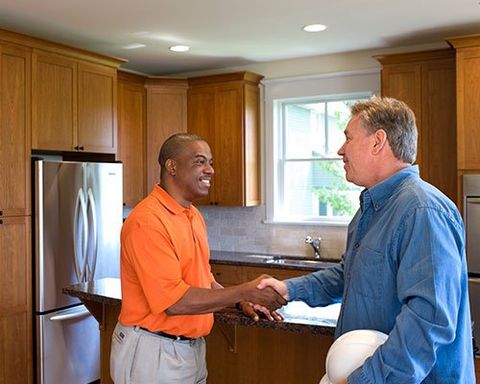 Contractor and Client Shaking Hands — South Lake, TX — Cunningham Contractors