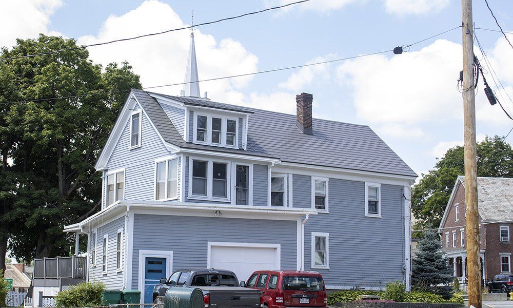 Arched Roof Metal Shingles on Quonset House