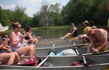 River Trip — Group of Friends Riding on Canoe in Kankakee, IL