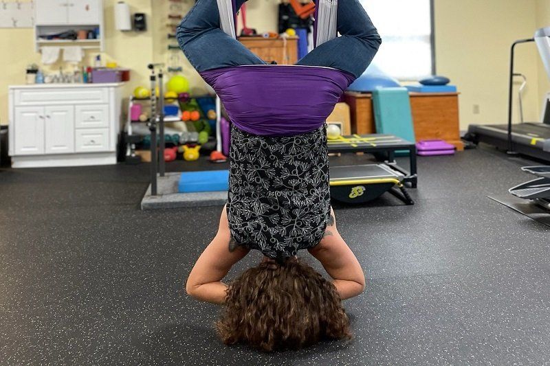 Aerial Yoga — Greenwich, NY — Helping Hands Physical Therapy