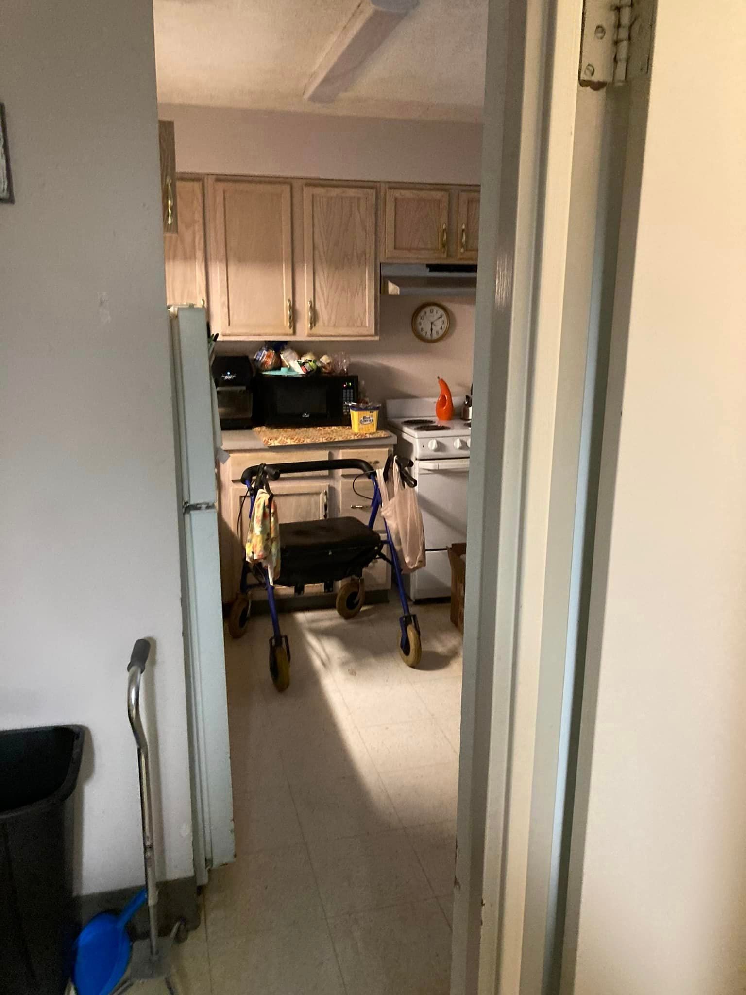 After is a tidy kitchen with the walker on the side