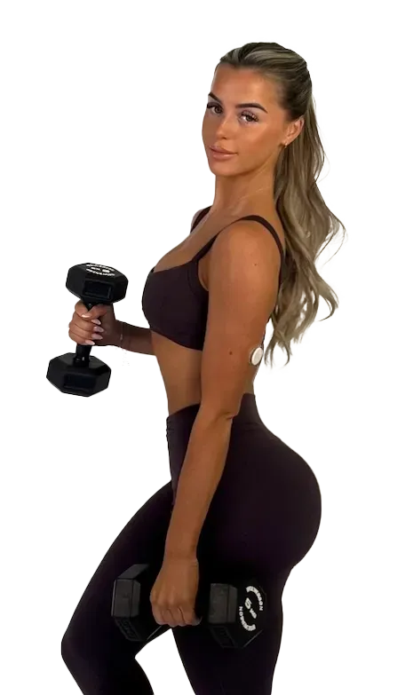 Woman in athletic wear holding dumbbells, posing with a side profile, dark brown outfit.