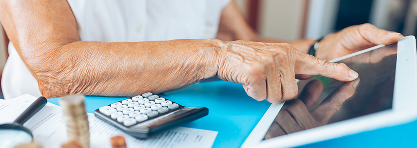 Senior Woman Checking her Finance and Investments