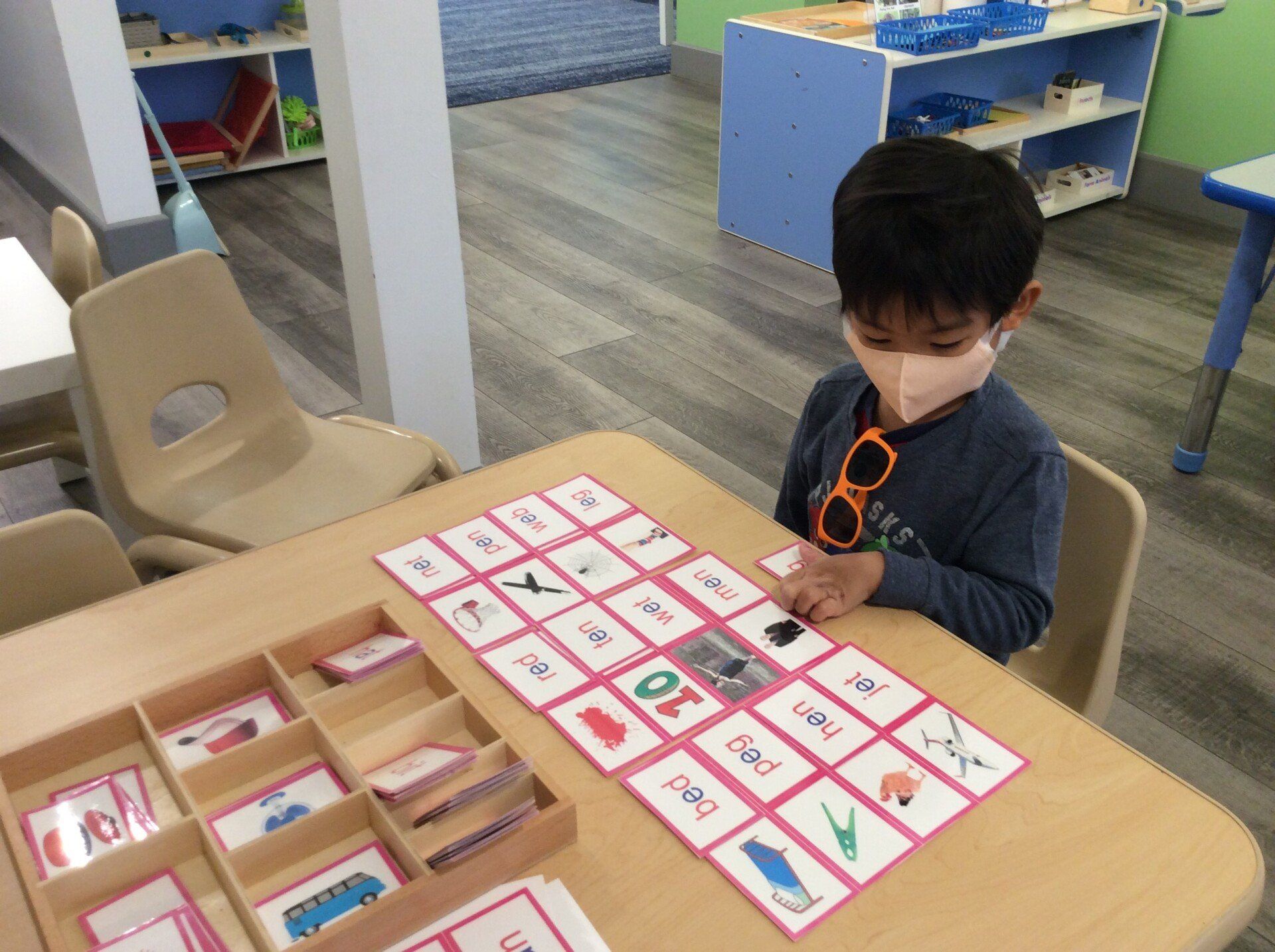 Child working with Montessori materials