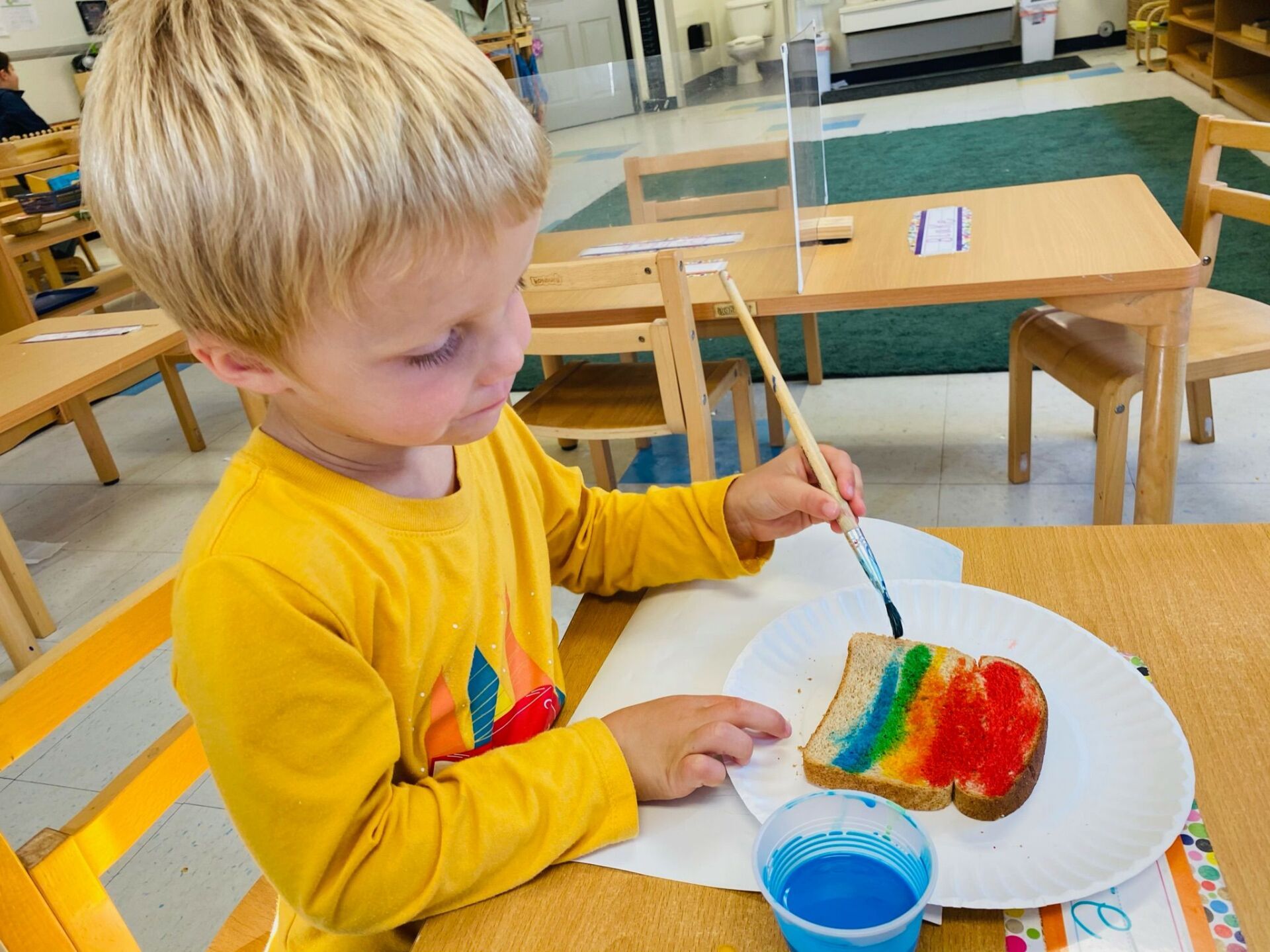 Montessori child learning cooking experience