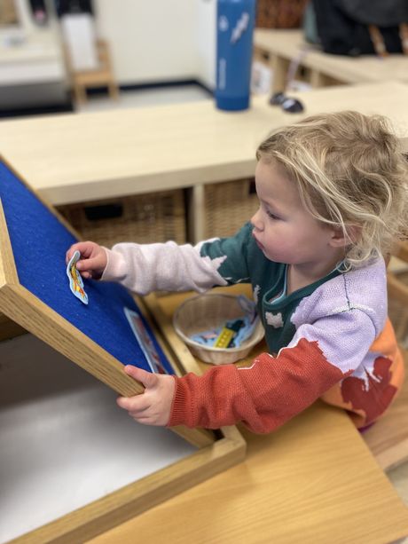 A child working in a Montessori classroom