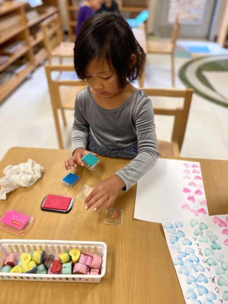 A child working with Montessori materials