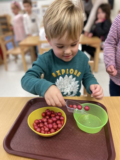 A child is learning cooking experience