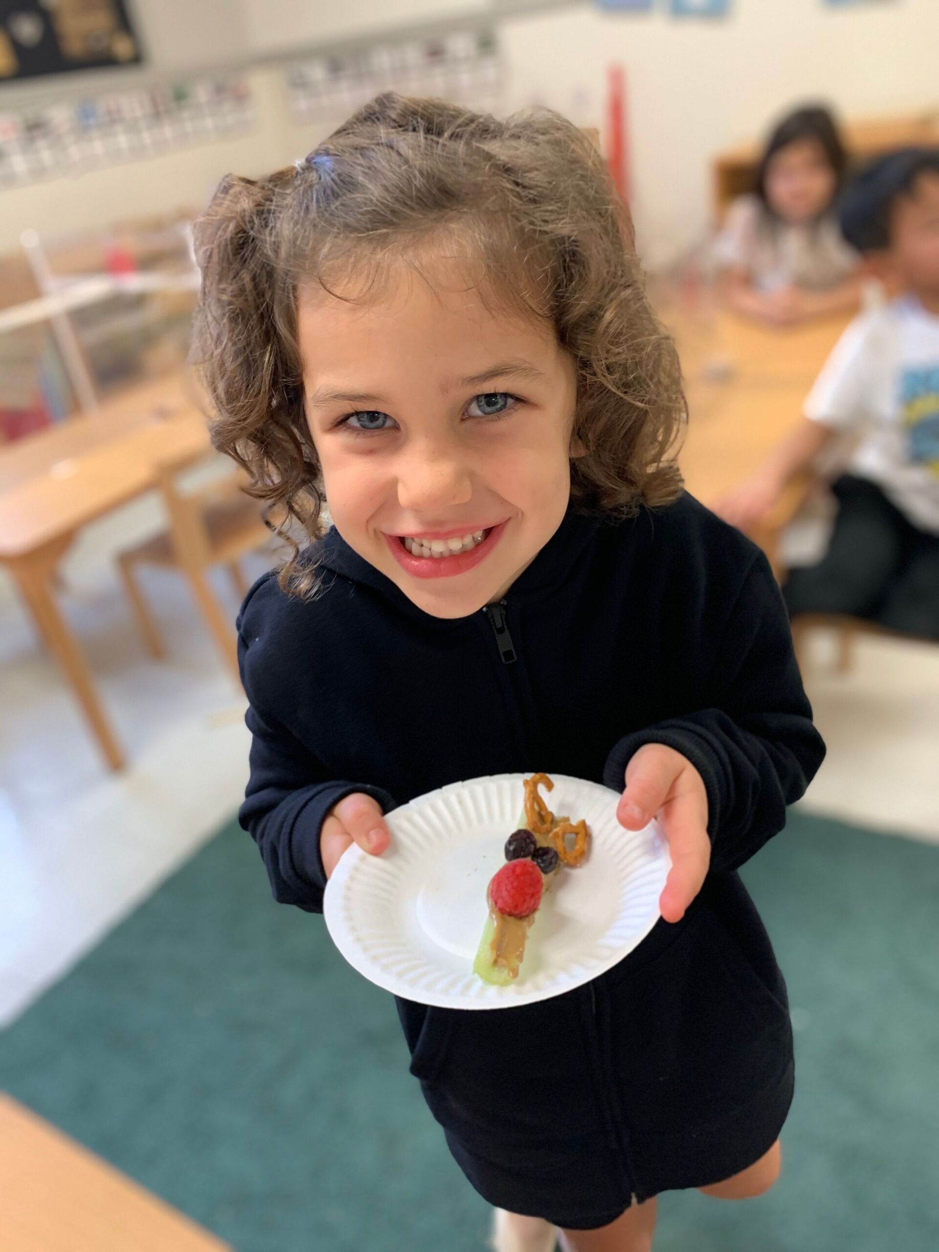Montessori child learning cooking experience