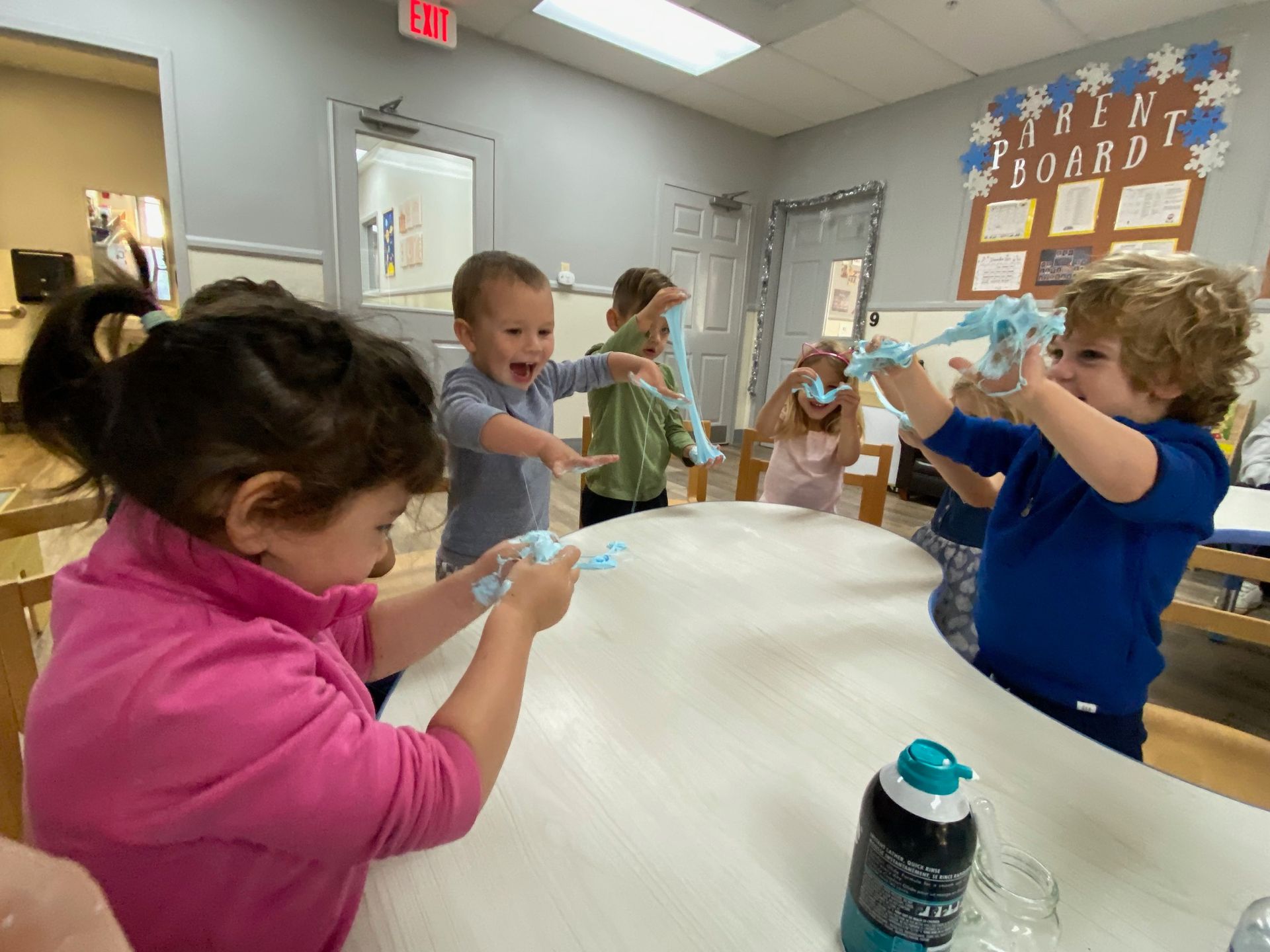 A group of Montessori child working in a scince task