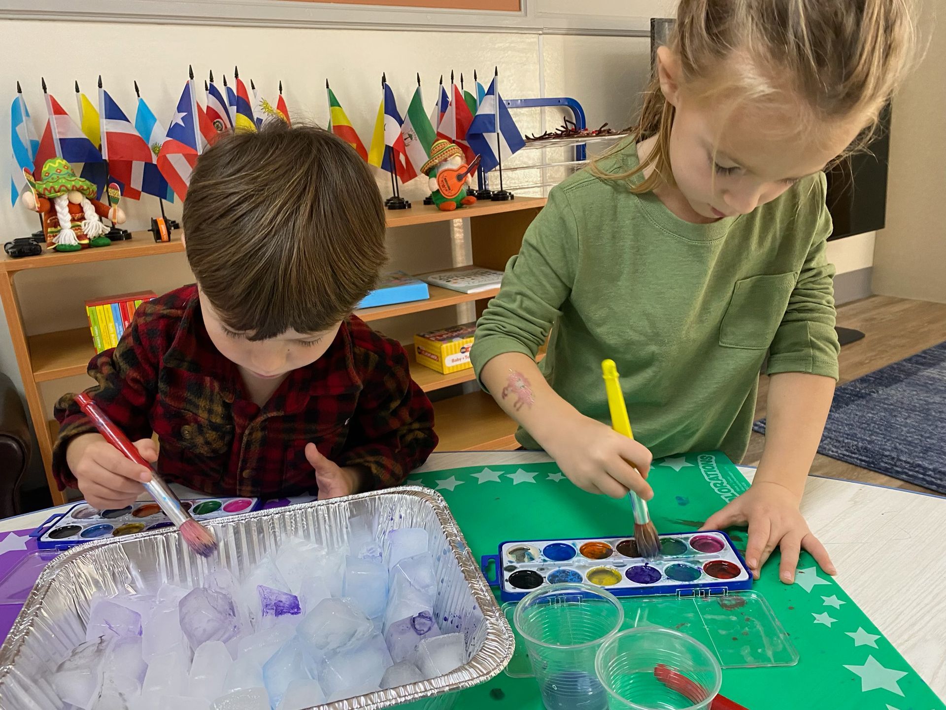 Two Montessori child working in a science task