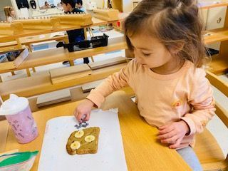 Montessori child learning cooking experience