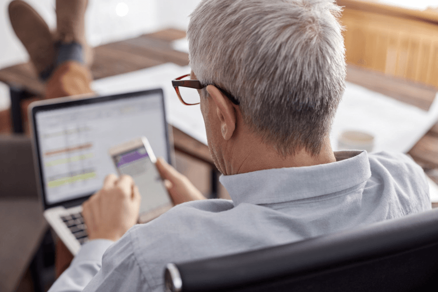 Man on laptop at desk