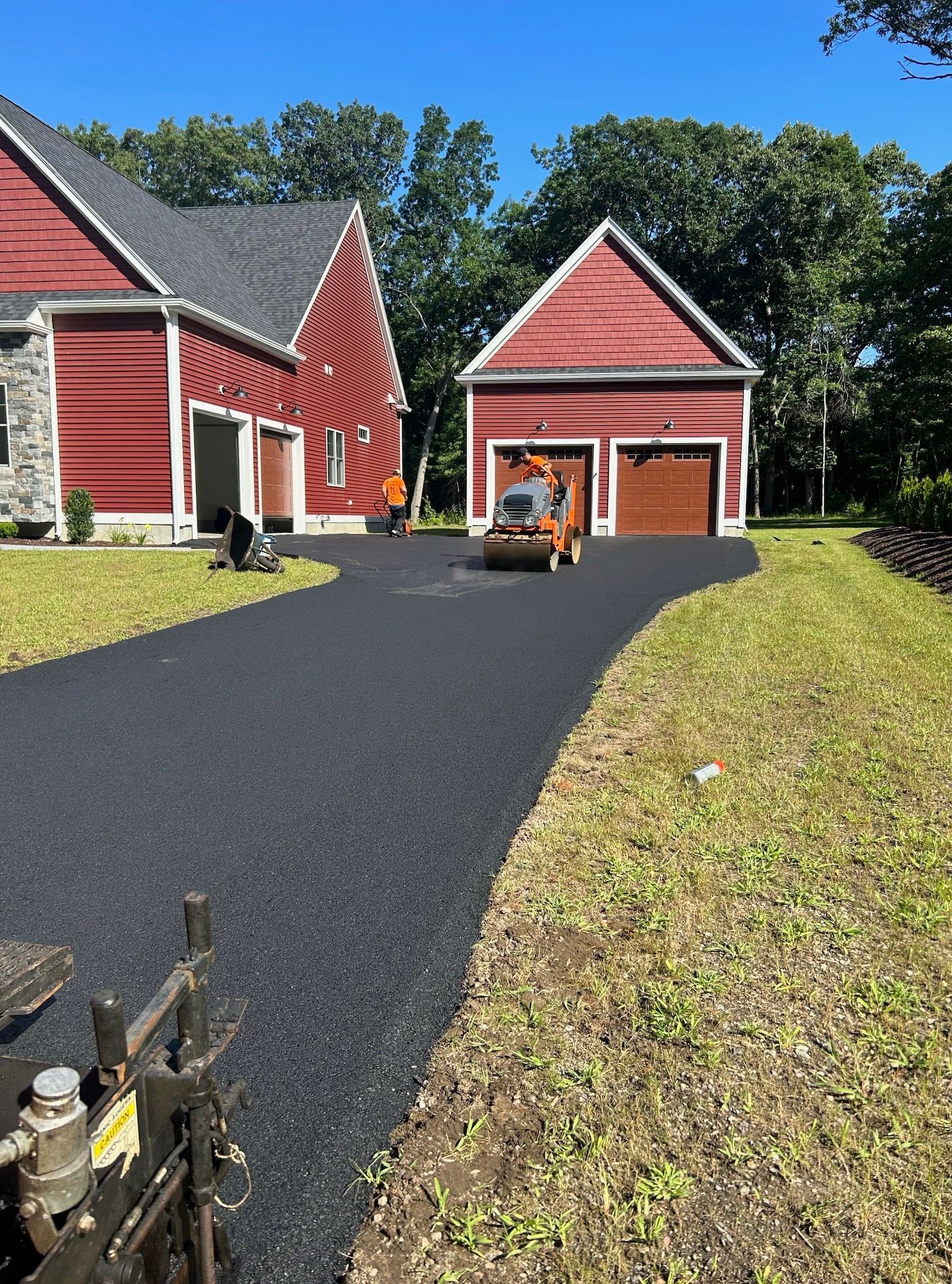 A driveway paving in Middleborough, MA by Cape Cod Paving 