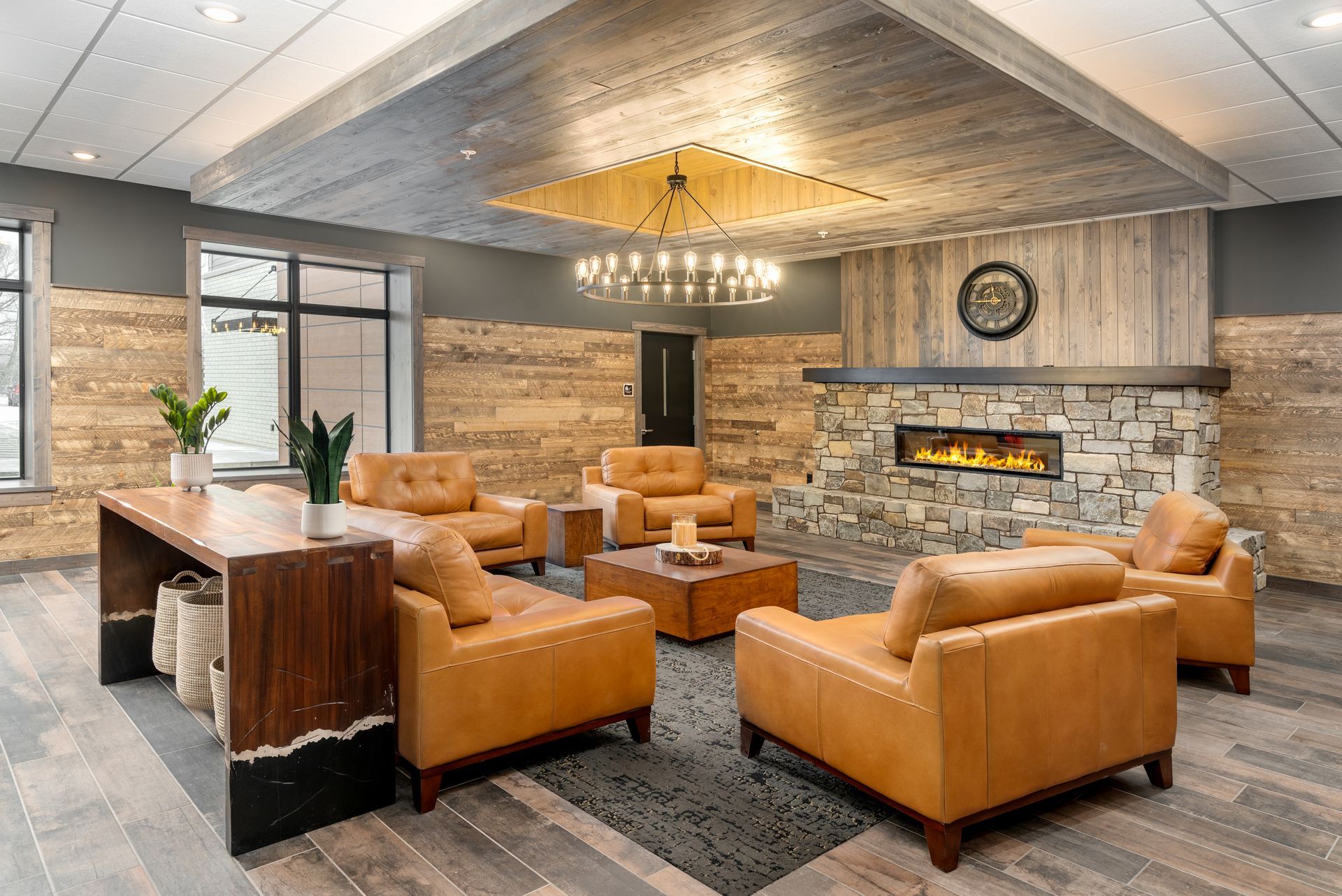 a living room filled with furniture and a fireplace .