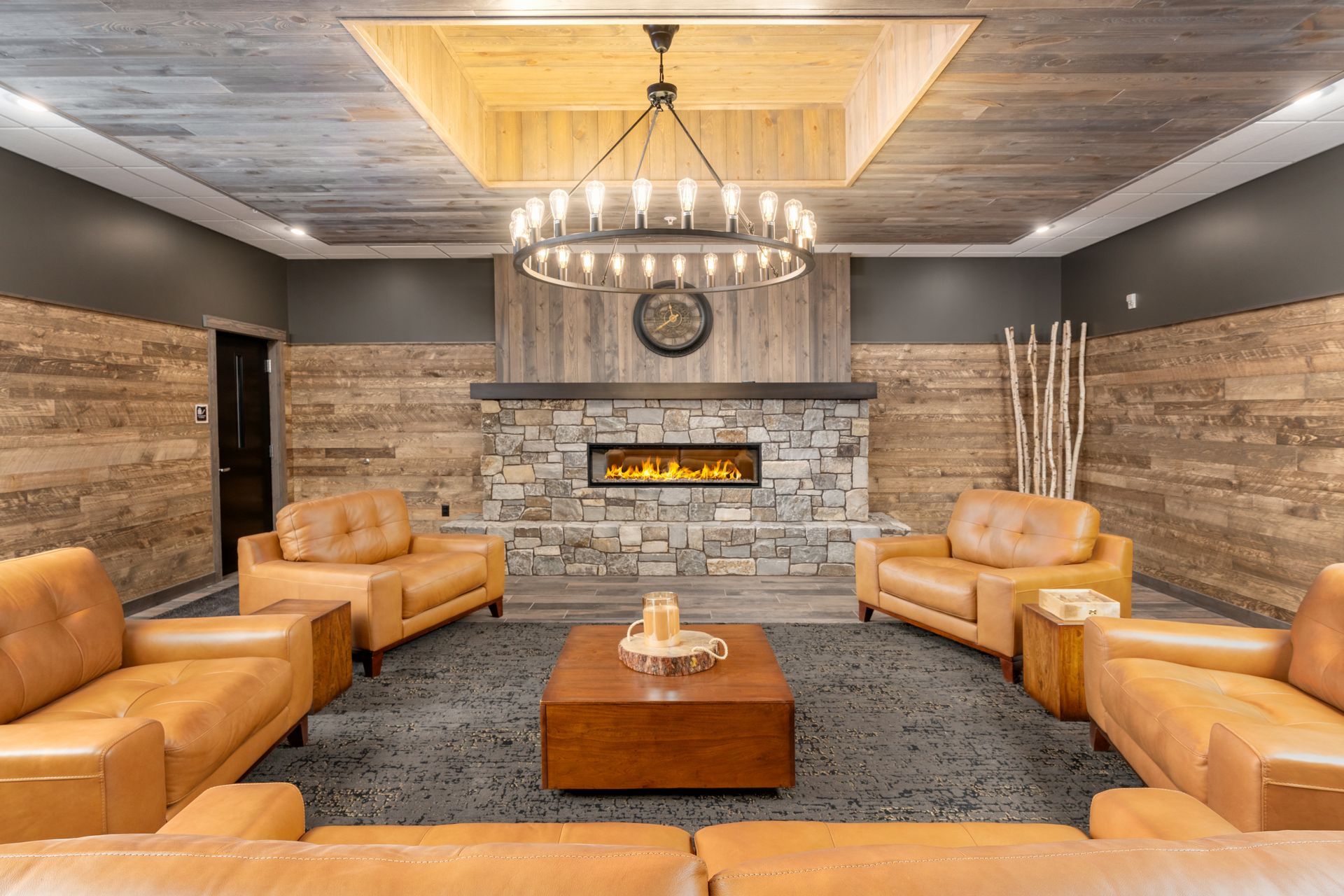 a living room filled with furniture and a fireplace .