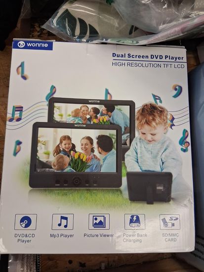 Box for a portable DVD player with dual screens. It shows a family watching a movie and a child playing with the device.