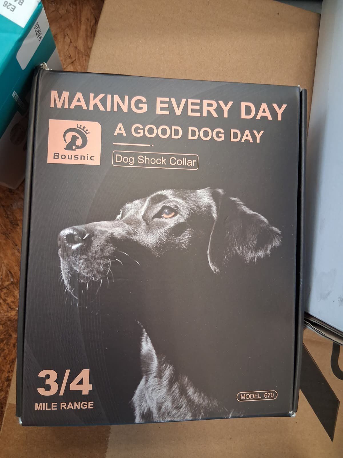 Box for a dog shock collar, featuring a black dog and text: