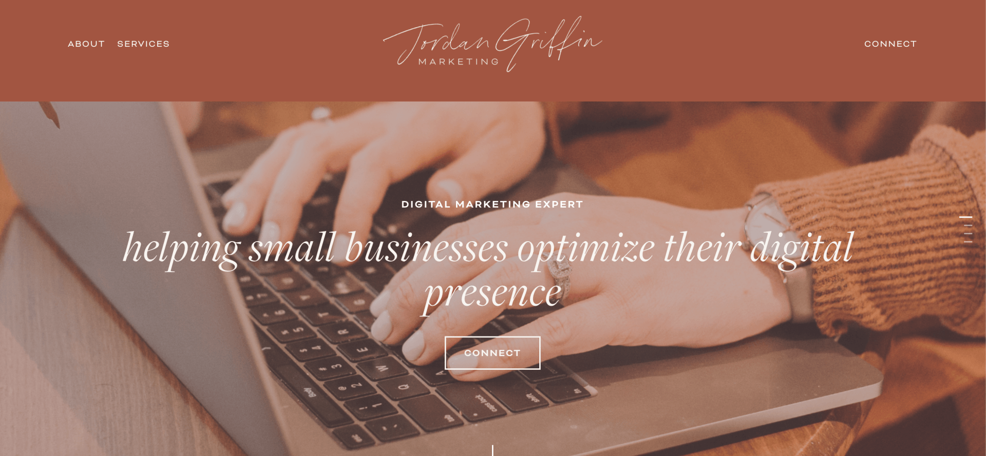 A person is typing on a laptop computer.