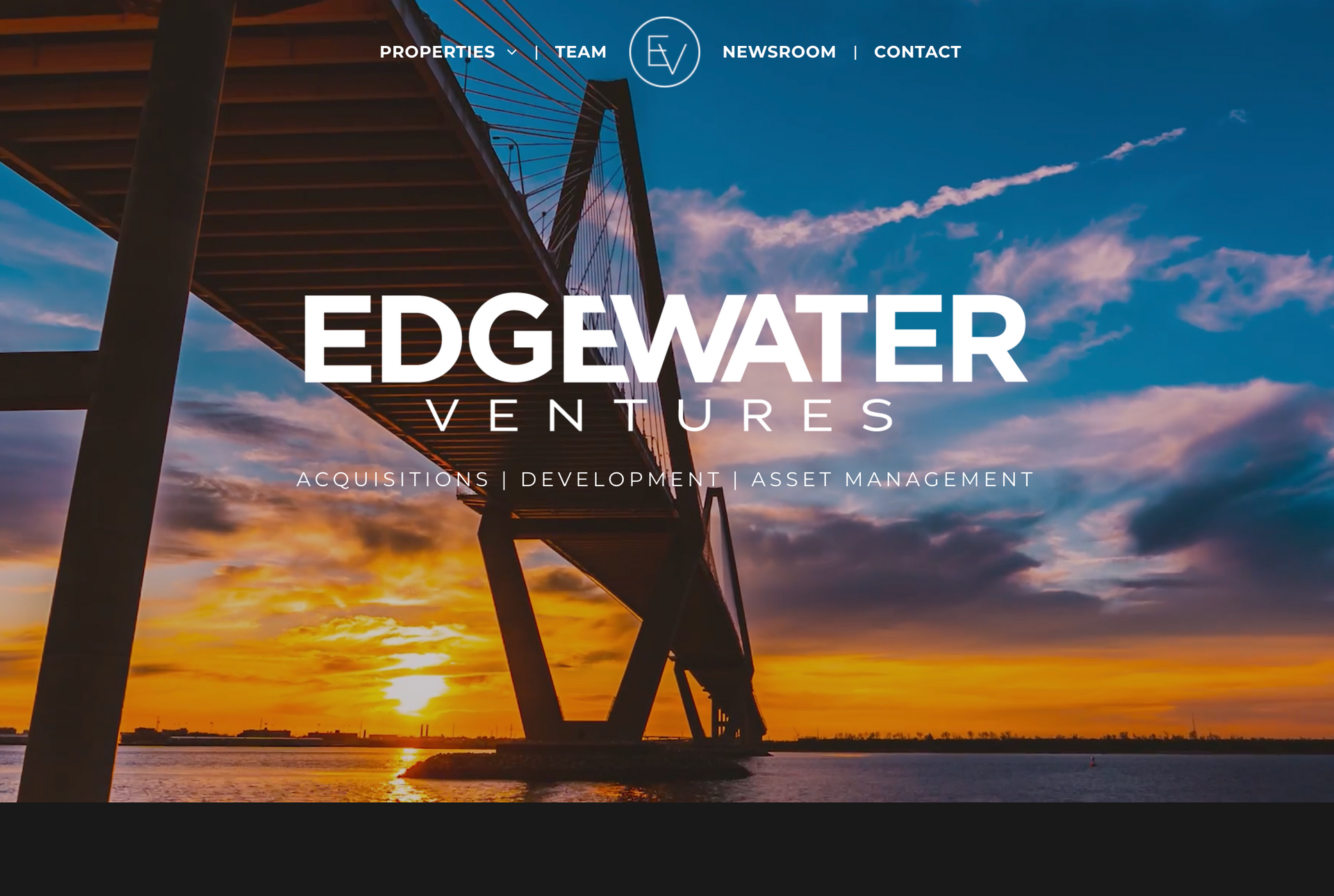 The website for edgewater ventures shows a bridge over a body of water at sunset.