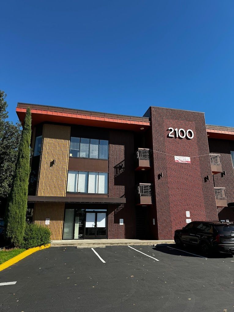 The number 2100 is on the side of a building