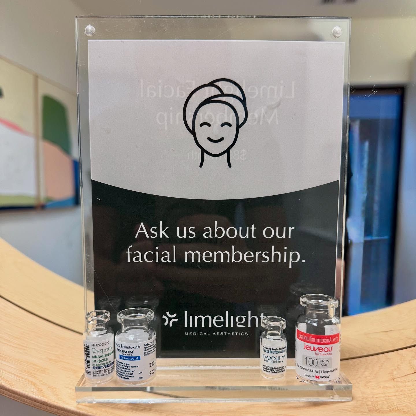 A woman is getting a facial treatment at a spa.