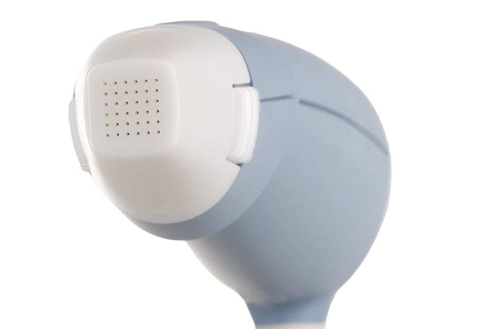 A close up of a blue and white device with holes in it