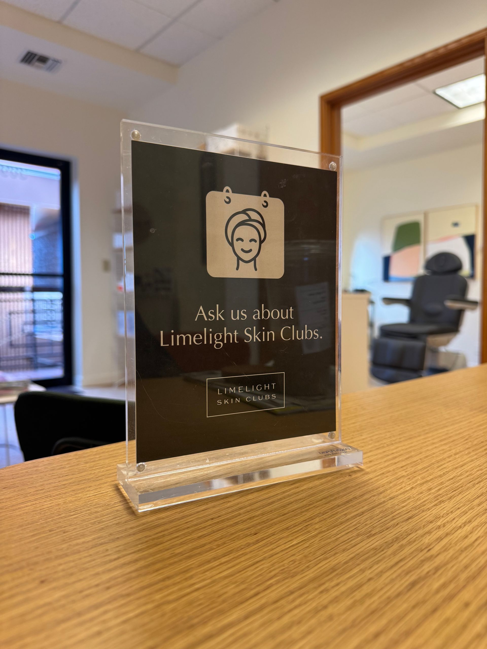 Sign on a wooden counter: 