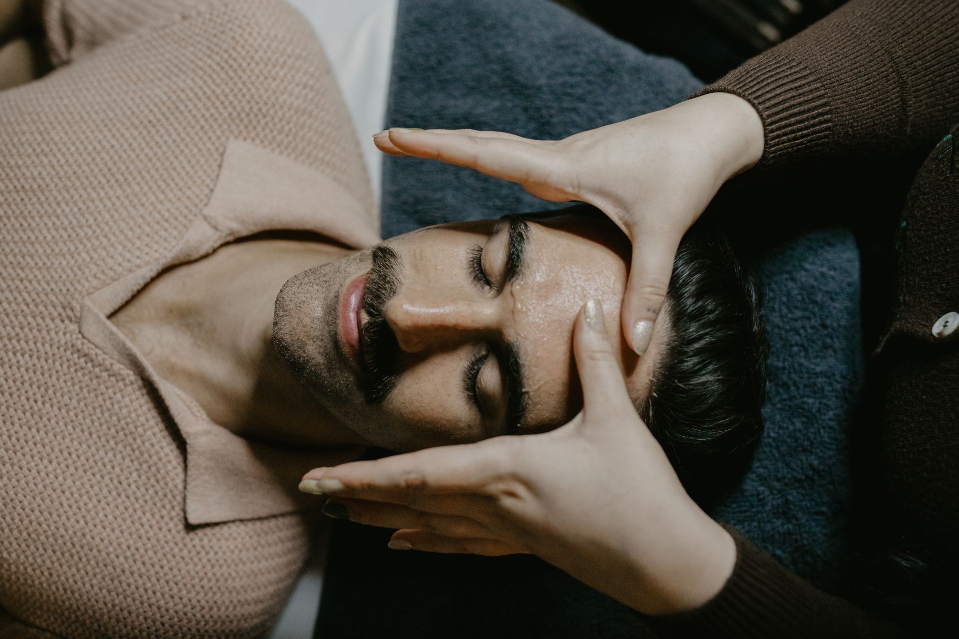 A tube of toothpaste with two plus signs around it.