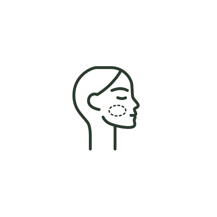 A line drawing of a woman 's face with a circle on her cheek.