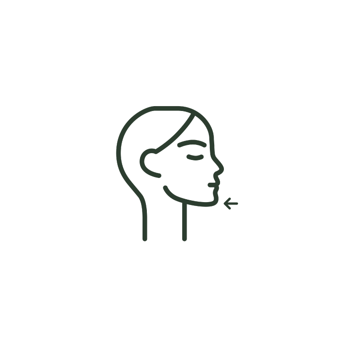 A line drawing of a woman 's face with her eyes closed and an arrow pointing to her chin.