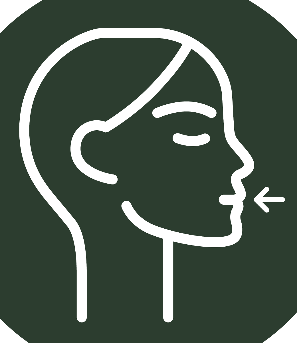 A dark green circle containing a white line-drawing of a human profile with an arrow pointing to the mouth.