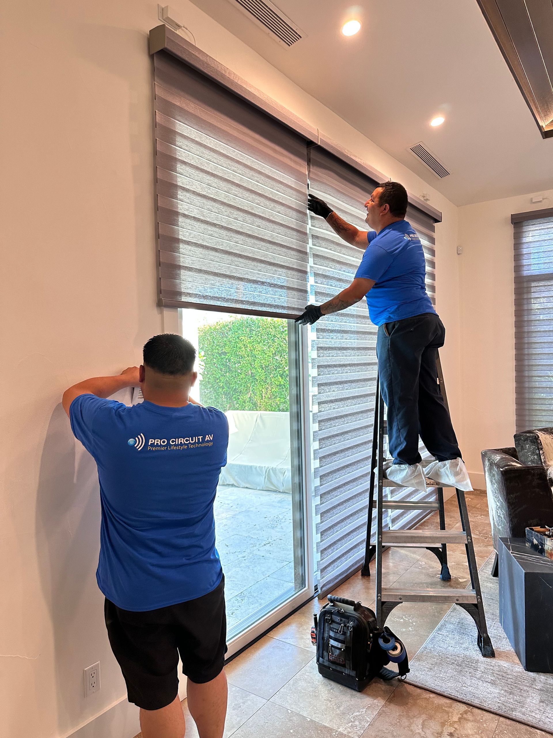 Workers working on shades