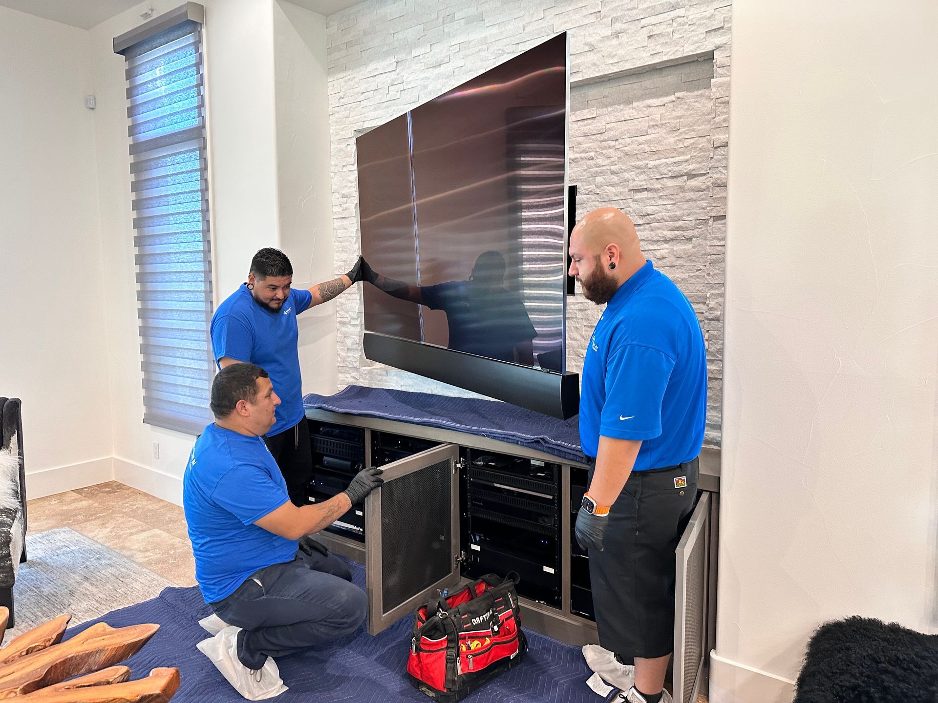 Workers working on tv