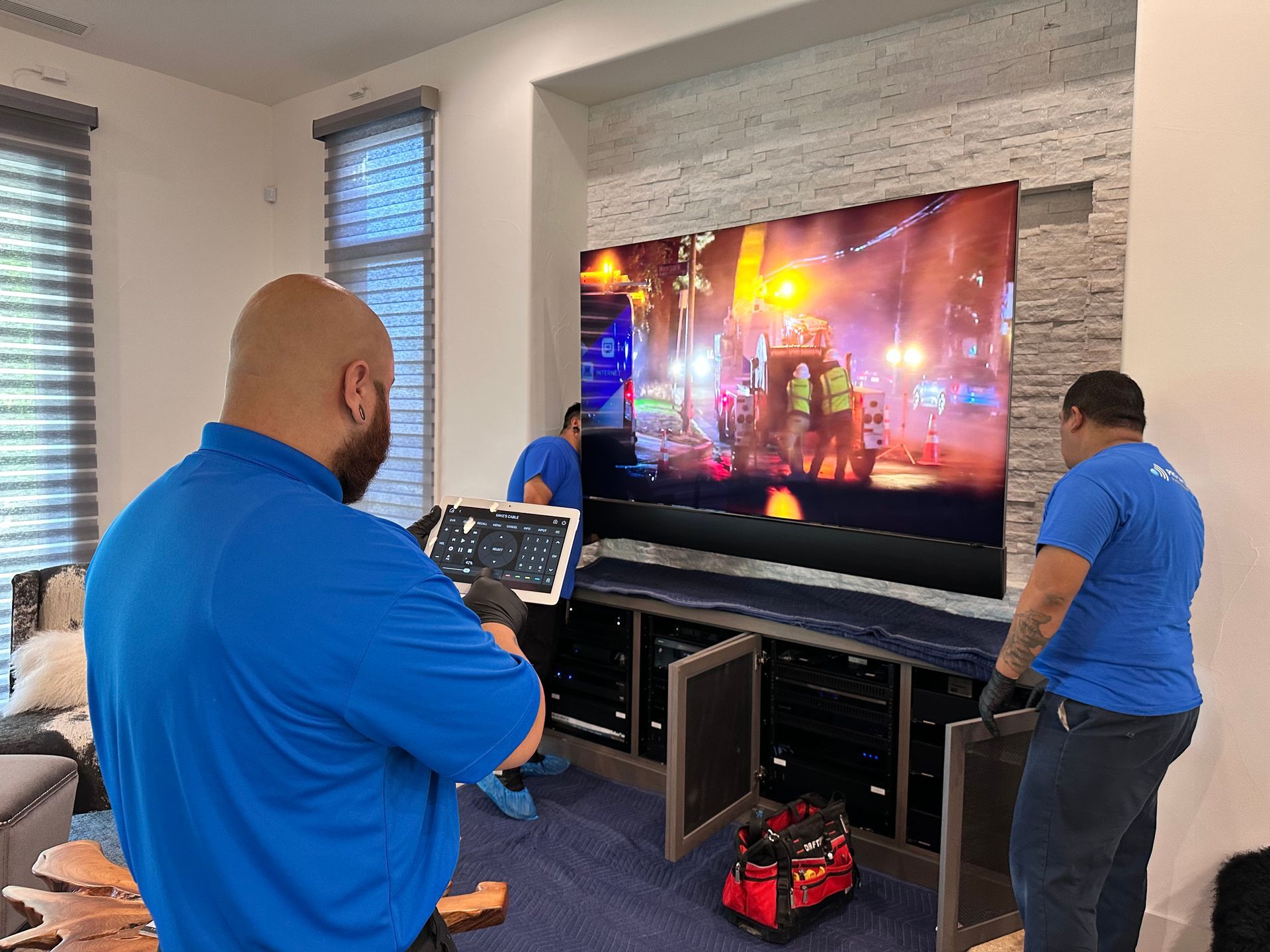 Workers evaluating TV